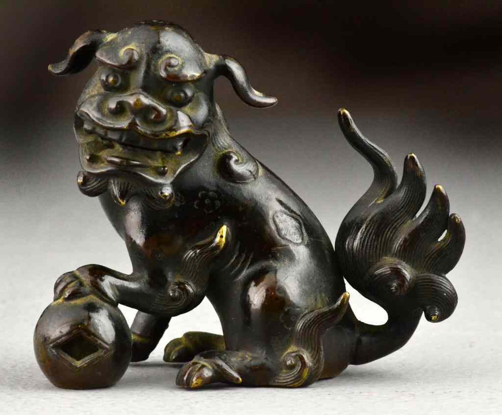 Appraisal: Chinese Qing Bronze Buddhist Foo LionFinely carved to depict a