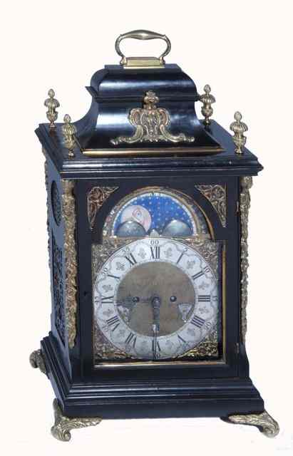 Appraisal: A GEORGIAN EBONISED BRACKET CLOCK with applied brass decoration the