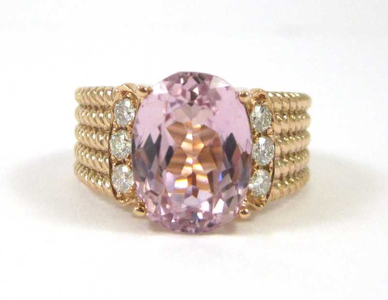 Appraisal: KUNZITE DIAMOND AND FOURTEEN KARAT GOLD RING The rose gold