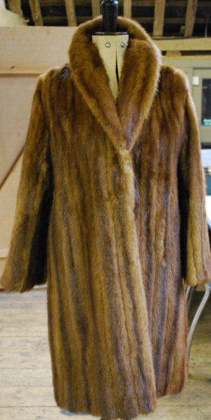 Appraisal: Lady's full-length musquash fur coat retailed by J R Cox