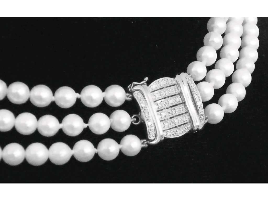 Appraisal: Cultured pearl three row uniform choker with an ct diamond