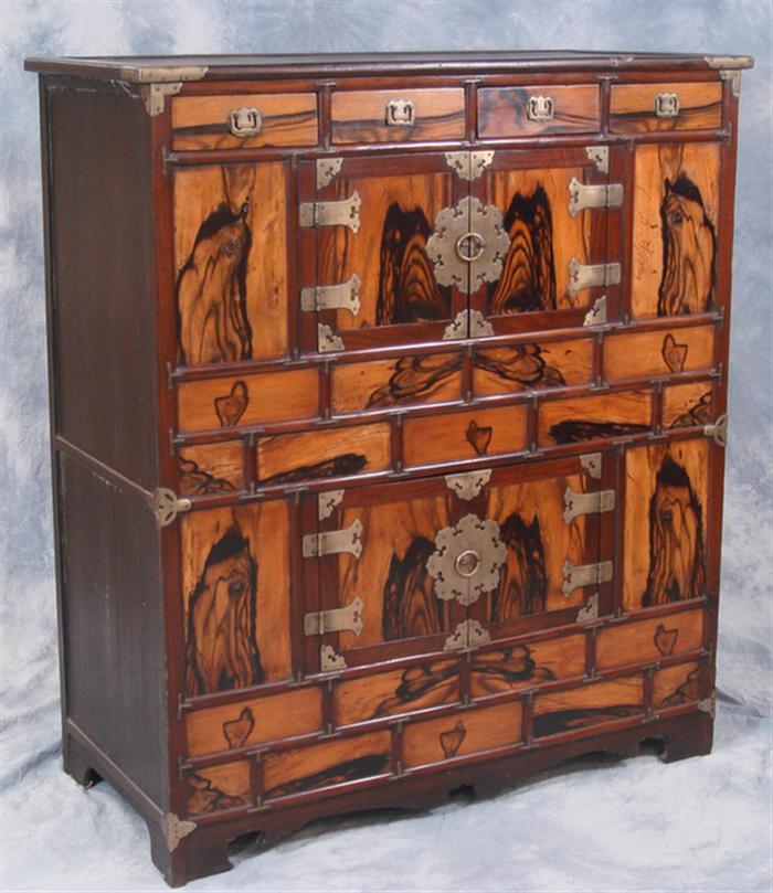 Appraisal: Korean campaign chest one piece fitted with small drawers and