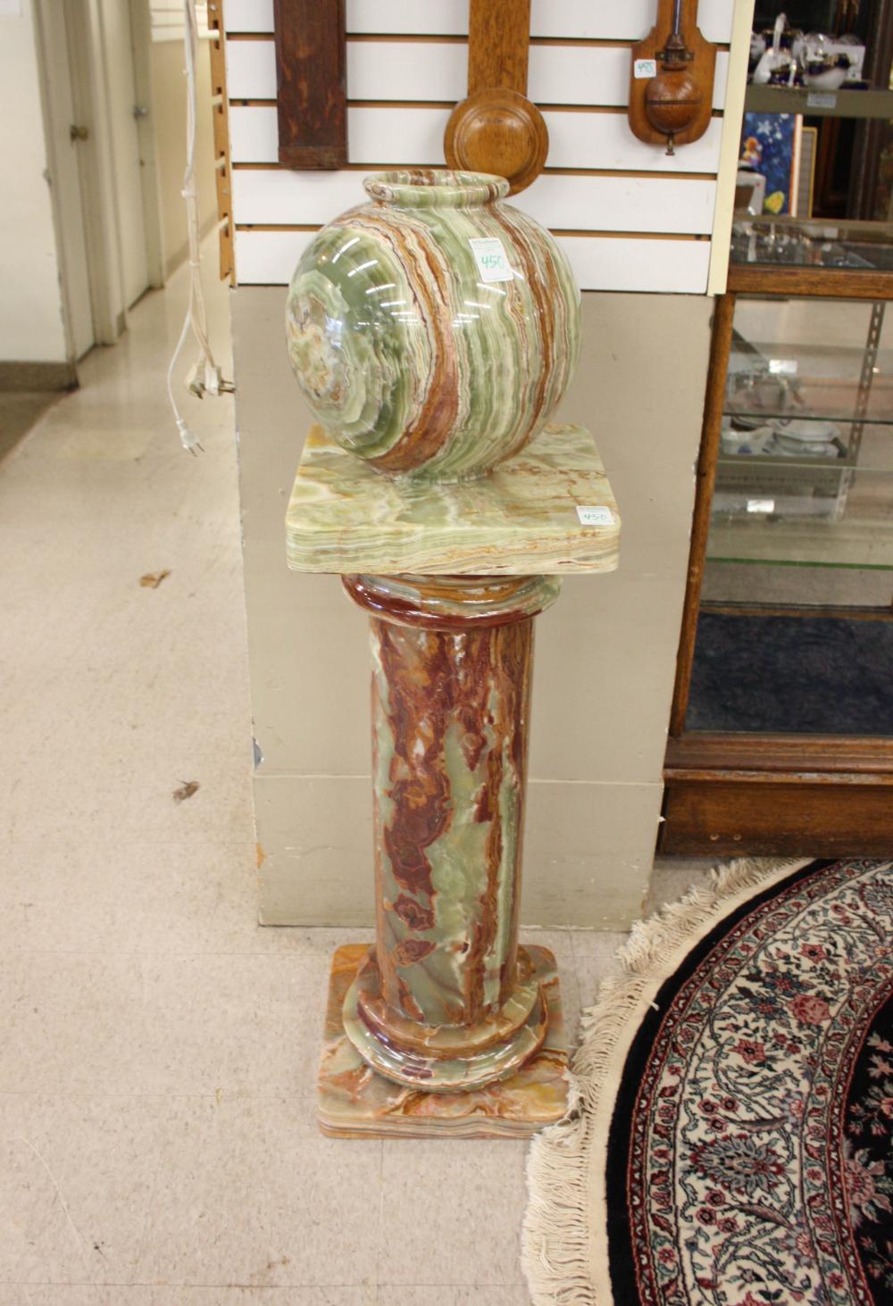 Appraisal: GREEN ONYX FLOOR PEDESTAL AND MATCHING URN the round column