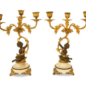 Appraisal: A Pair of Gilt and Patinated Bronze Figural Three-Light Candelabra