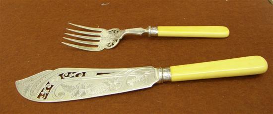 Appraisal: George V silver fish servers with pierced scroll decoration bone