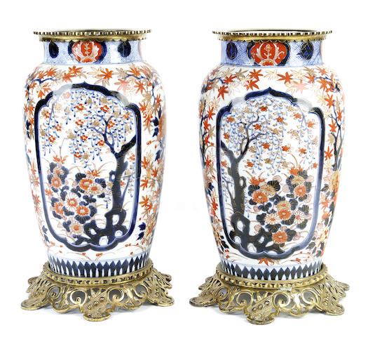 Appraisal: A pair of Japanese Imari ormolu-mounted vases circa Of slender