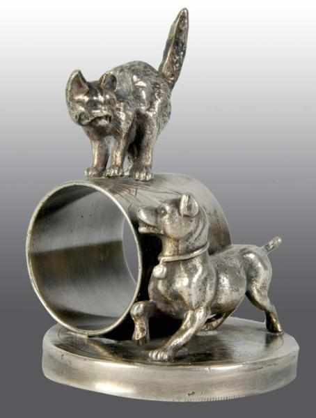 Appraisal: Large Fighting Cat Dog Napkin Ring Description Marked F B