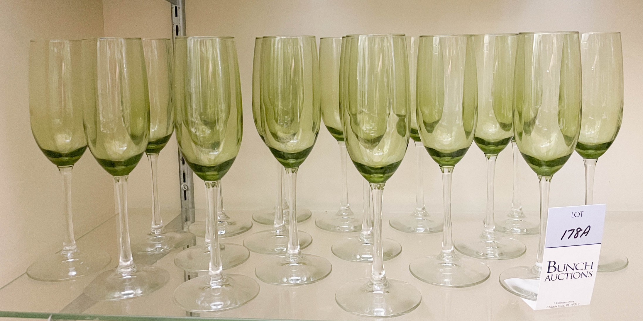 Appraisal: Crystal champagne flutes olive green bowl clear stems unmarked -