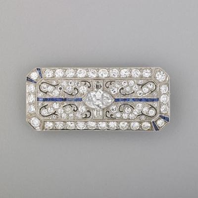 Appraisal: ART DECO DIAMOND SAPPHIRE PLATINUM PANEL BROOCH Canted rectangle centers