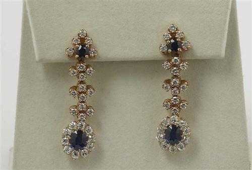 Appraisal: BRILLIANT-CUT DIAMOND AND SAPPHIRE EARRINGS Ros gold Elegant decorative stud