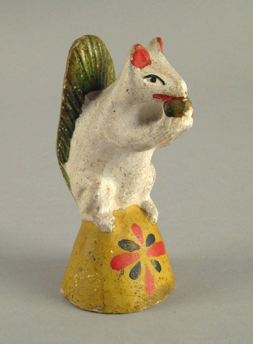 Appraisal: Chalkware figure of a squirrel th c eating a nut