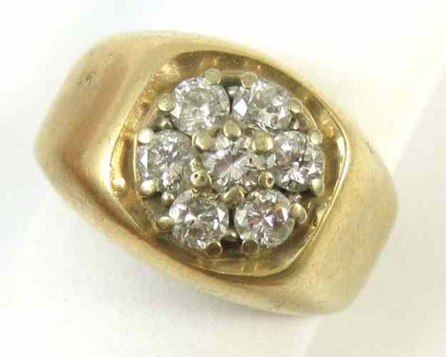 Appraisal: MAN'S DIAMOND CLUSTER AND FOURTEEN KARAT GOLD RING having a