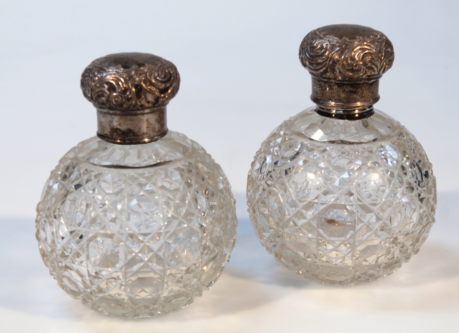 Appraisal: A pair of early thC cut glass and silver dressing