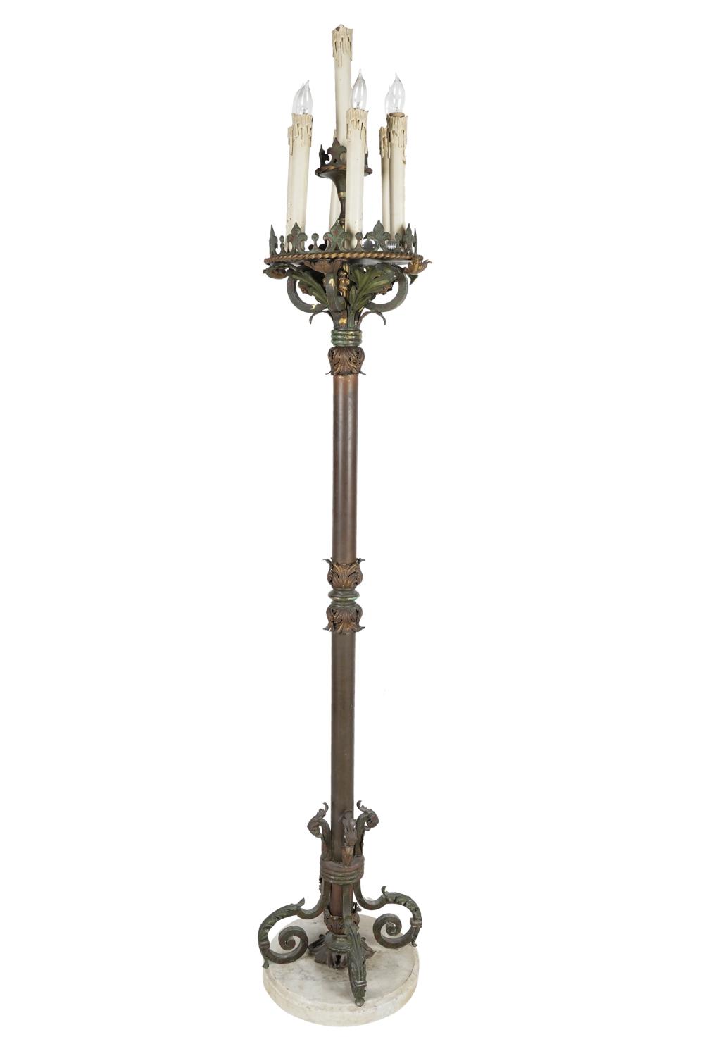 Appraisal: GOTHIC STYLE PATINATED METAL TORCHIEREwith seven lights on a stone