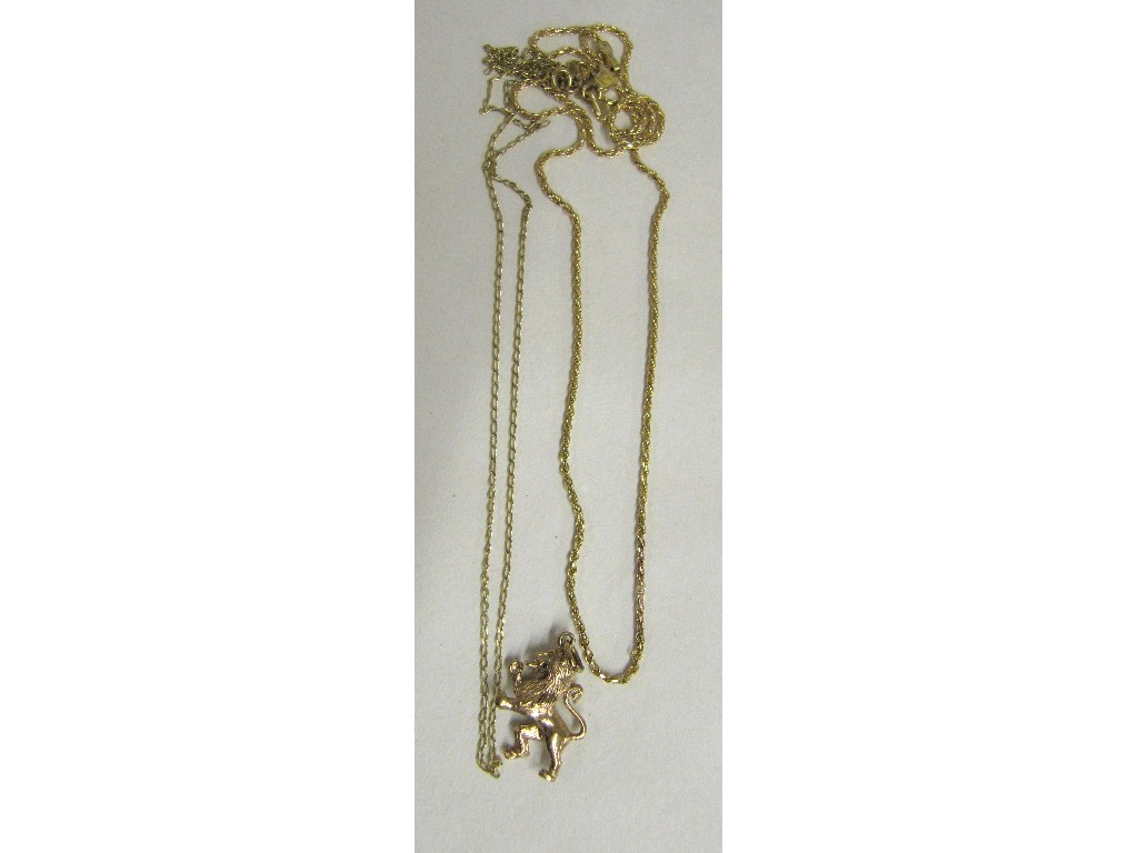 Appraisal: Lot comprising ct gold lion rampant pendant and two ct