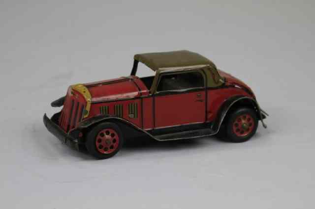 Appraisal: FIRE DEPT AUTO Marx lithographed tin red auto with brown