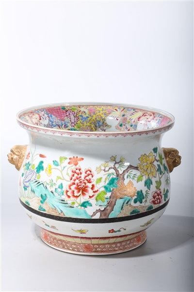 Appraisal: Chinese enameled porcelain jardiniere with floral and butterfly motifs gilt