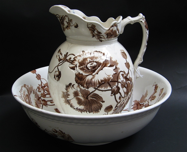 Appraisal: ENGLISH PORCELAIN PITCHER AND BOWL SET in the Harvest pattern