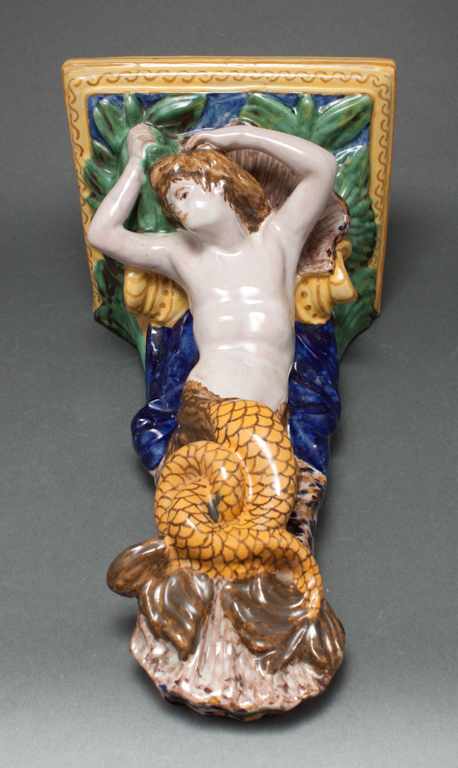 Appraisal: French faience nereid-form wall bracket early th century modeled as