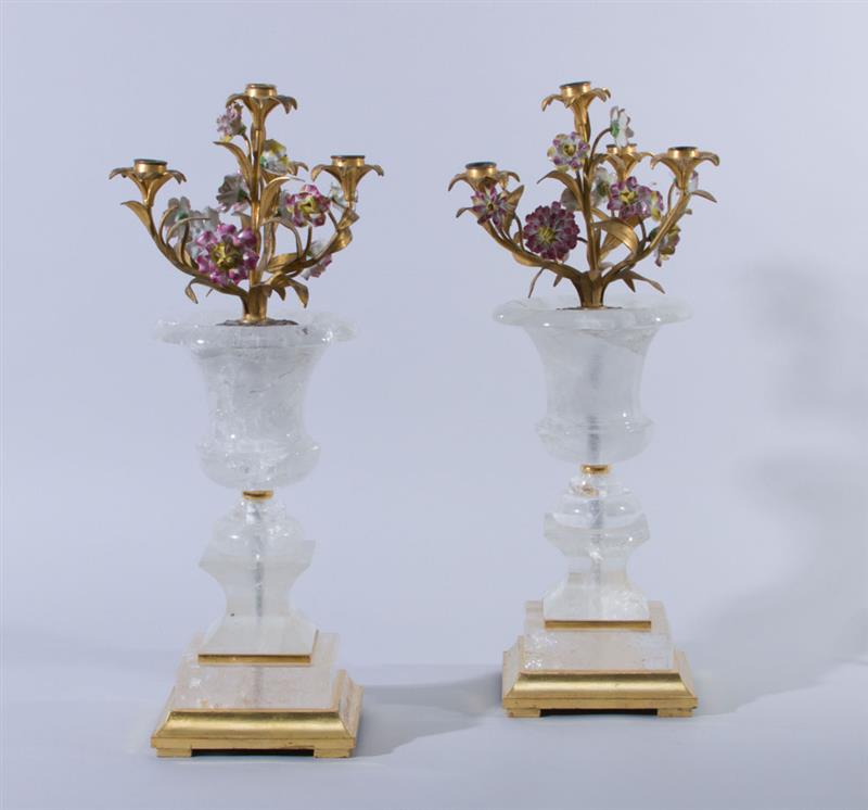 Appraisal: PAIR OF LOUIS XVI STYLE GILT-METAL FOUR-LIGHT CANDELABRA Mounted in