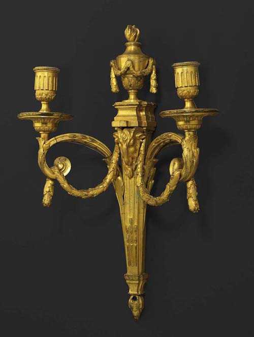 Appraisal: PAIR OF GILT BRONZE APPLIQUES AUX TETES DE BELIERS Louis