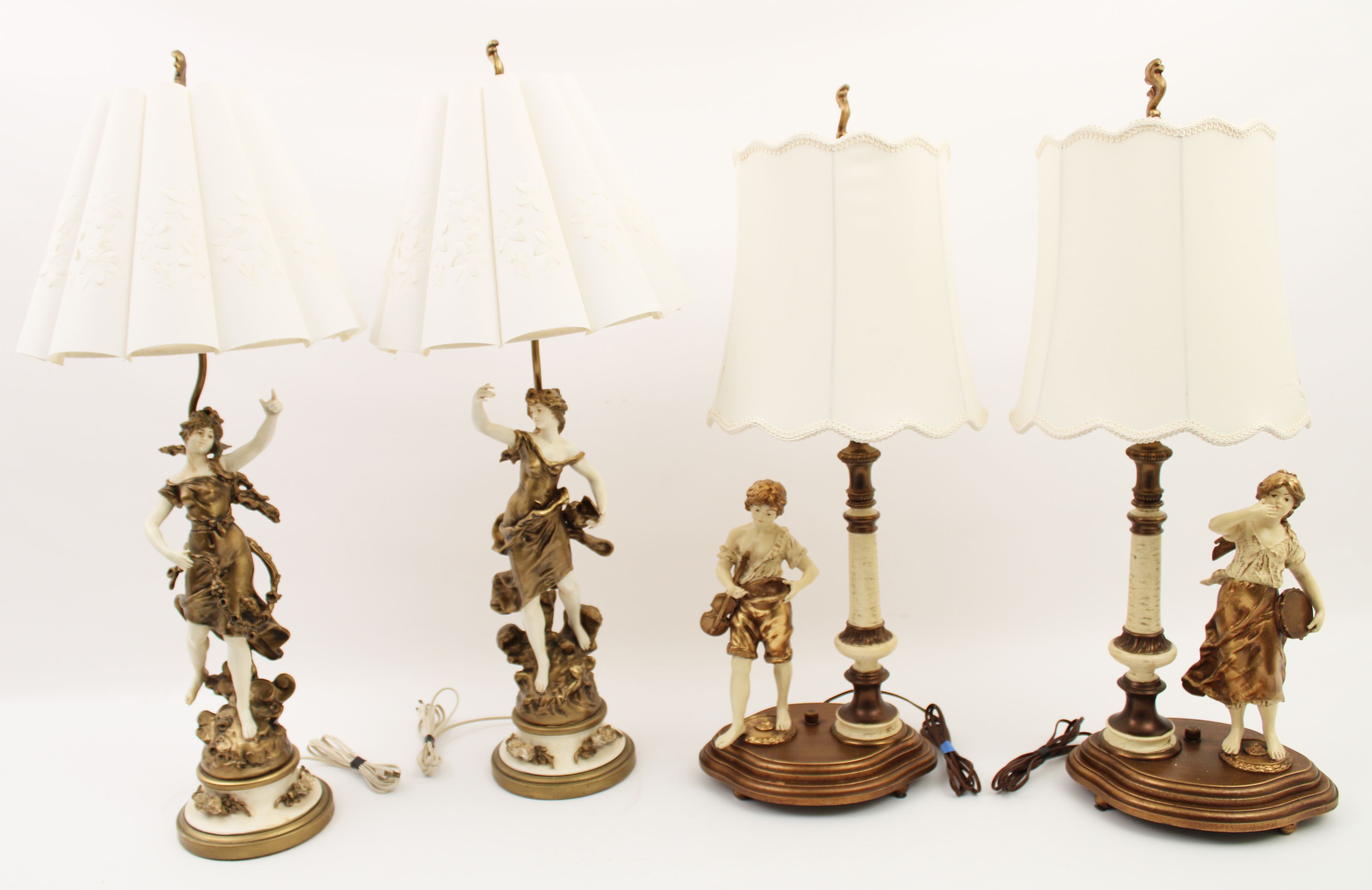 Appraisal: TWO PAIRS OF BISQUE PORCELAIN FIGURAL LAMPS Two pairs of