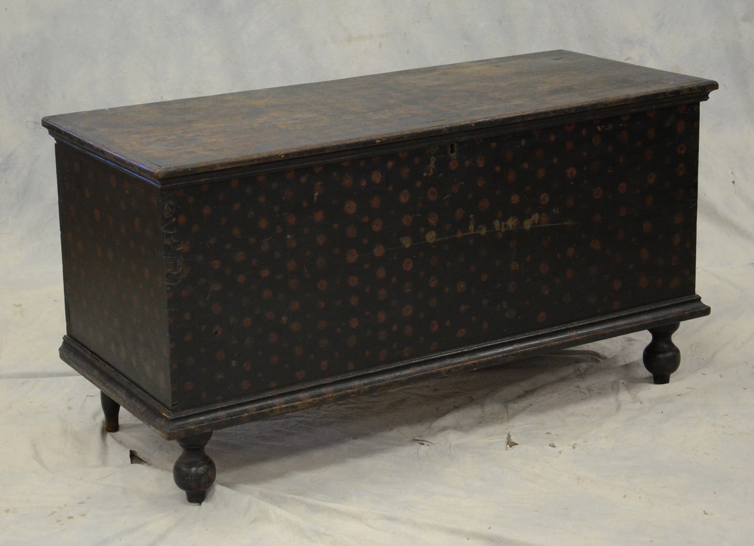 Appraisal: Poplar dovetailed blanket chest with turned ball feet old oxidized