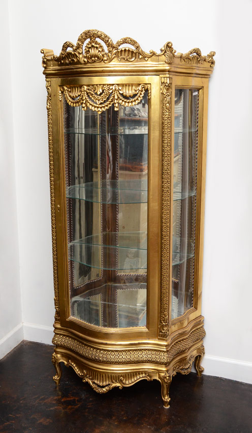 Appraisal: FRENCH STYLE CARVED GOLD GILT DISPLAY CABINET Carved gallery with