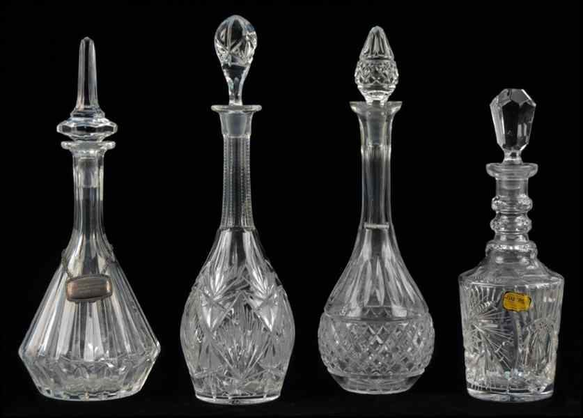 Appraisal: GROUP OF FOUR CRYSTAL DECANTERS Tallest '' Condition No Specific