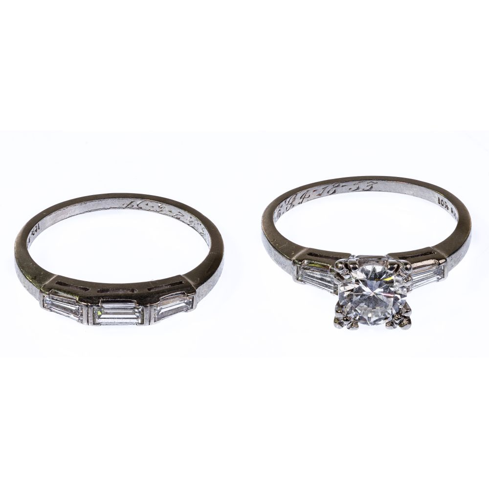 Appraisal: PLATINUM AND DIAMOND WEDDING BAND SETIncluding an engagement ring having