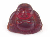 Appraisal: A vintage antique red amber Chinese Buddha repair to bottom