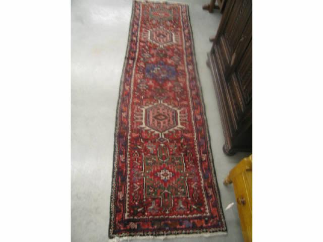 Appraisal: Heriz Persian Handmade Runner medallions of geometric designs ' x