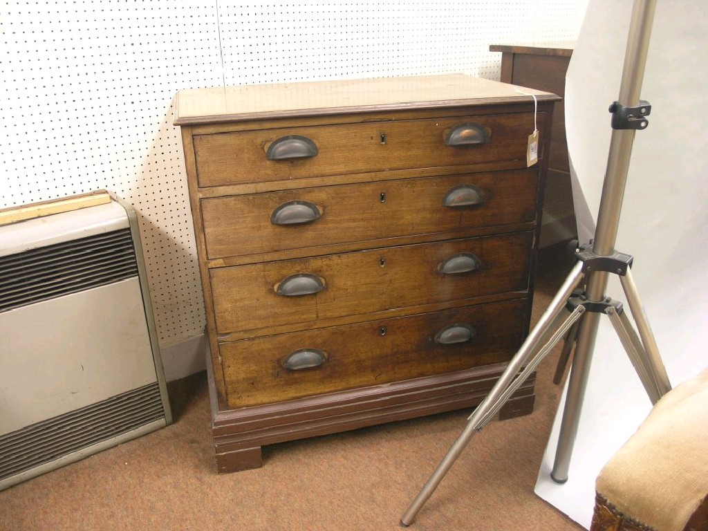 Appraisal: A George III mahogany chest of drawers four long oak-lined