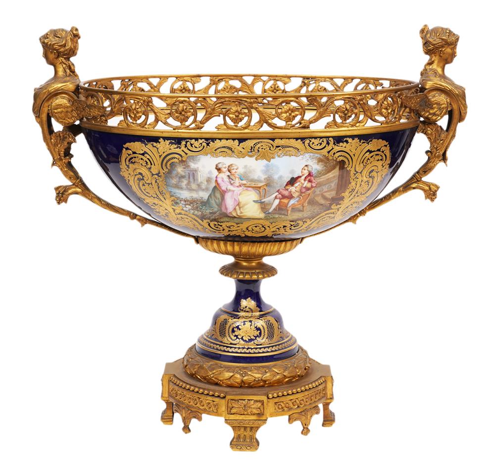 Appraisal: SEVRES GILT BRONZE MOUNTED PORCELAIN CENTERPIECESevres ormolu gilt bronze mounted