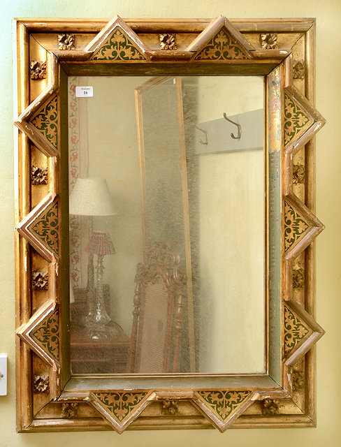 Appraisal: A LATE VICTORIAN GOTHIC REVIVAL MIRROR FRAME with mirror head