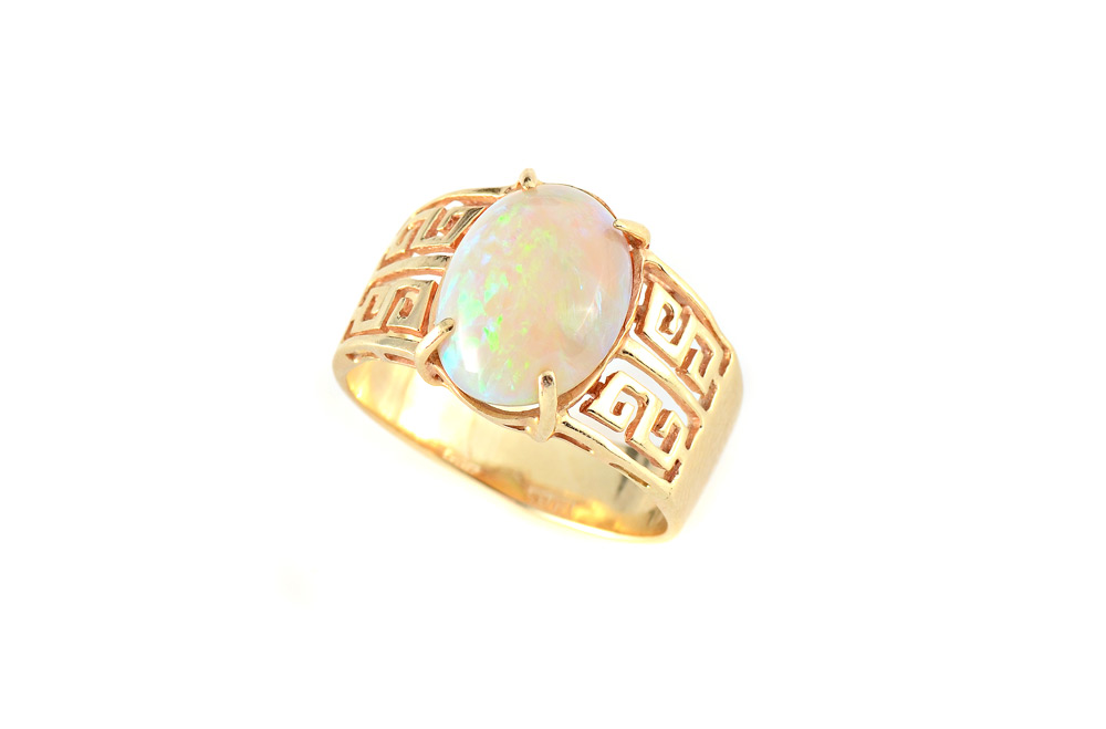 Appraisal: OPAL GREEK KEY DESIGN RING K yellow gold ring centers