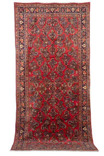 Appraisal: A Sarouk long carpet Northwest Persia A Sarouk long carpet