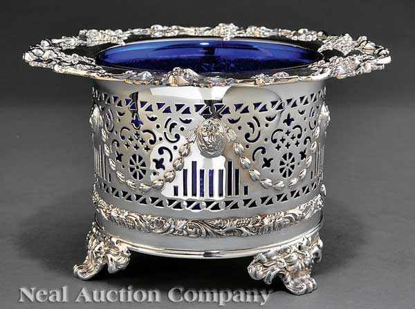 Appraisal: An English Victorian Reticulated Silverplate Centerbowl with Cobalt Liner c