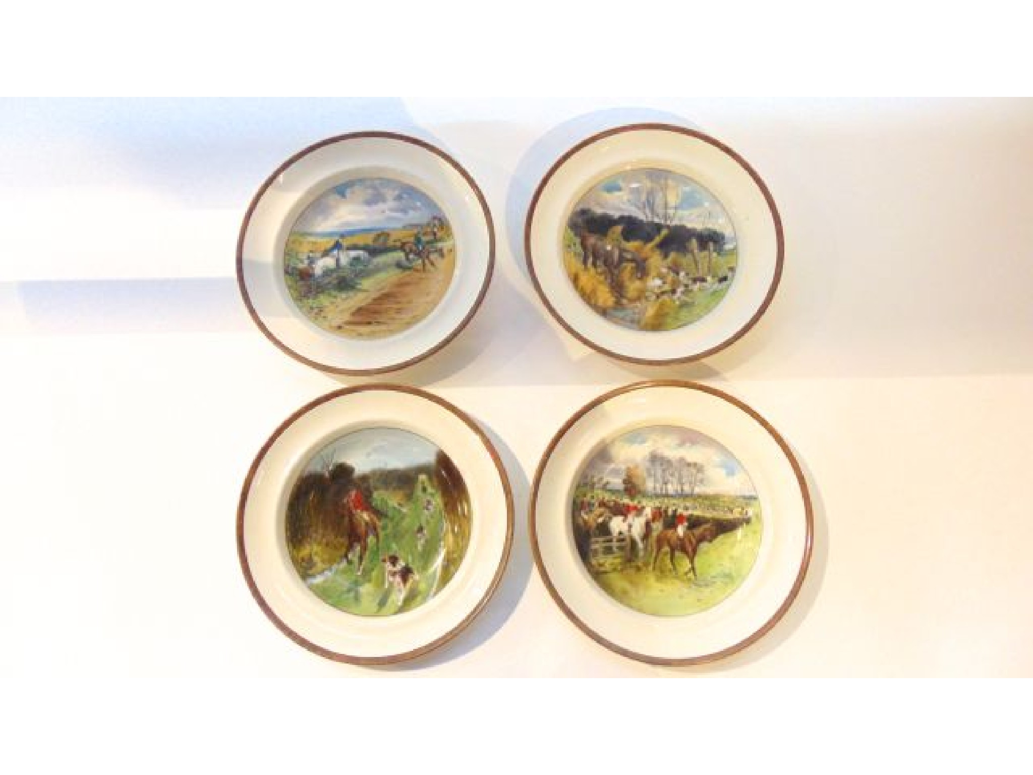 Appraisal: An unusual set of four Copeland soup plates with printed