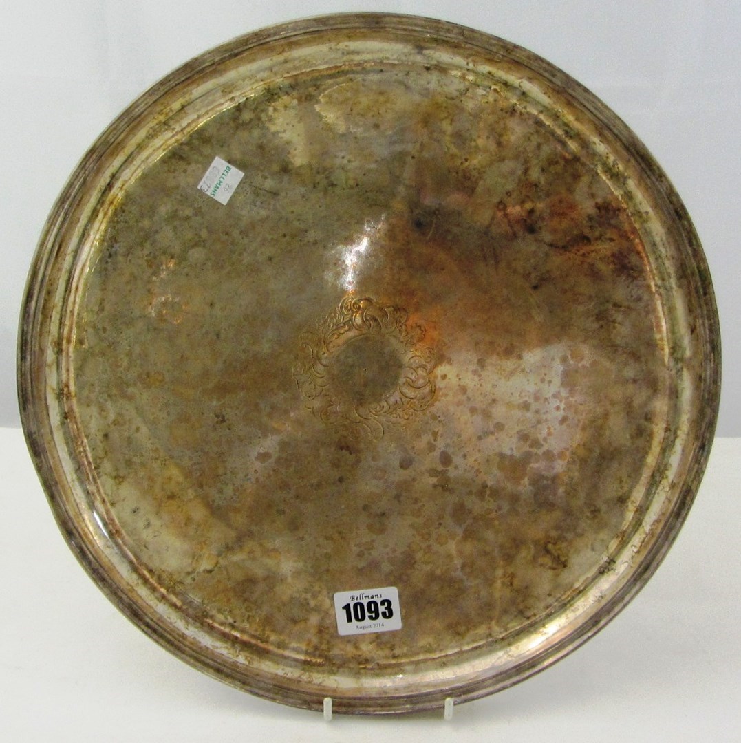 Appraisal: A Queen Anne silver circular salver decorated with a scrolled