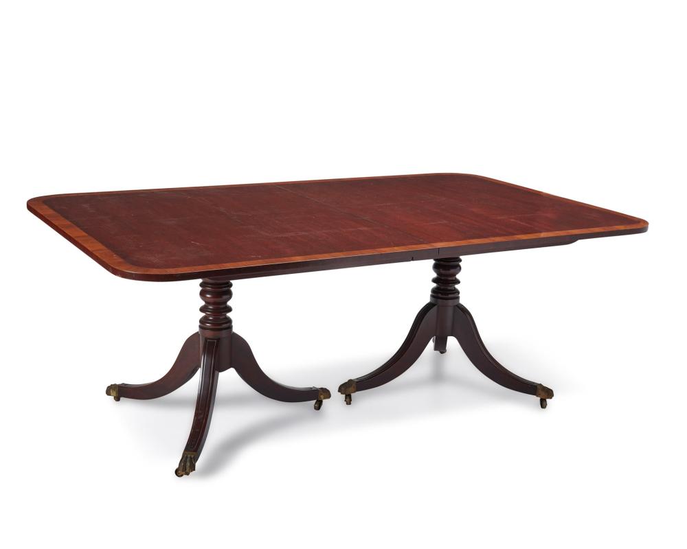 Appraisal: A Kittinger Chippendale-style dining table Fourth-Quarter th Century With paper