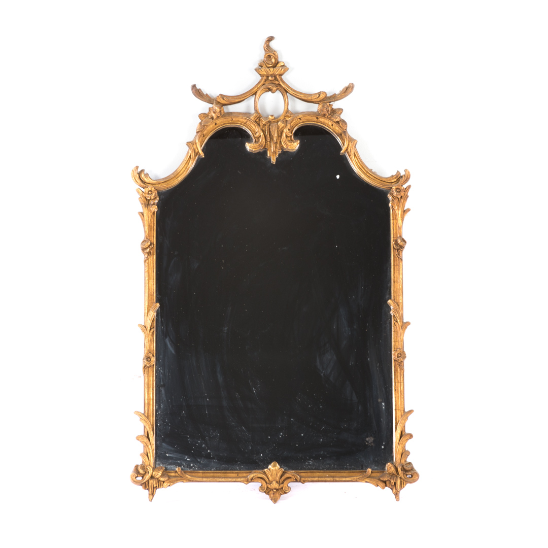 Appraisal: Italian Rococo style carved giltwood mirror early th century shaped