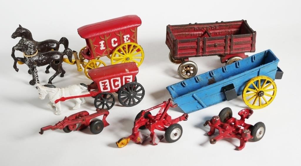 Appraisal: TH C ARCADE AND UNMARKED CAST METAL TOYSArcade farm wagon