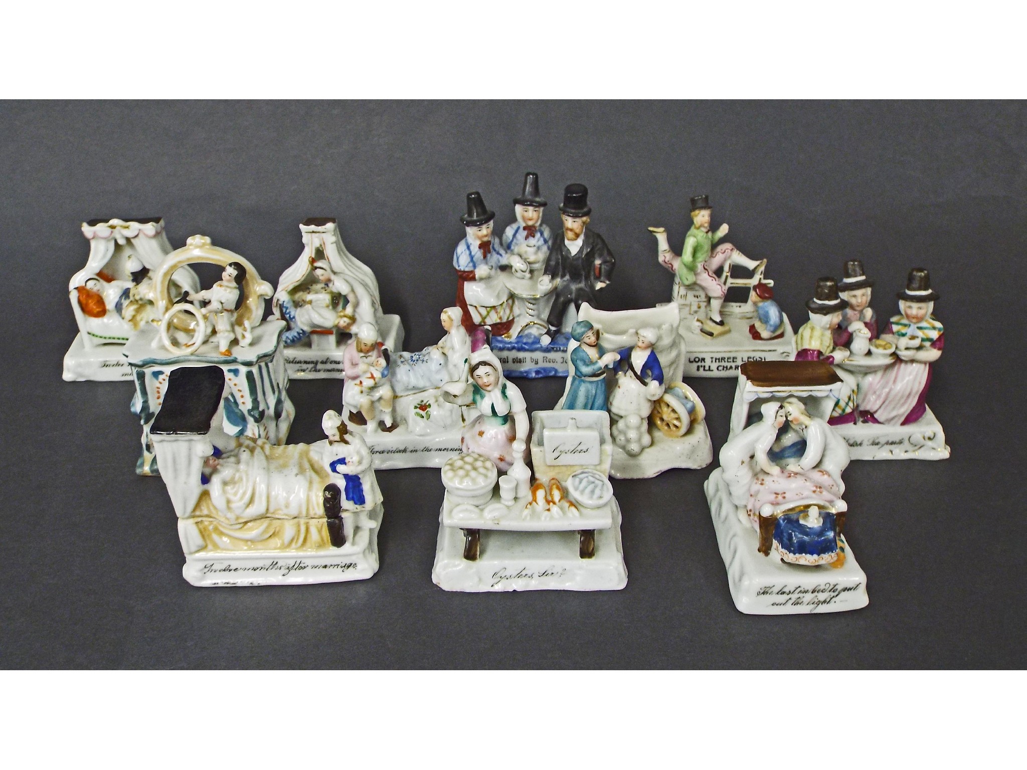 Appraisal: Collection of eleven porcelain fairings many inscribed with comical text