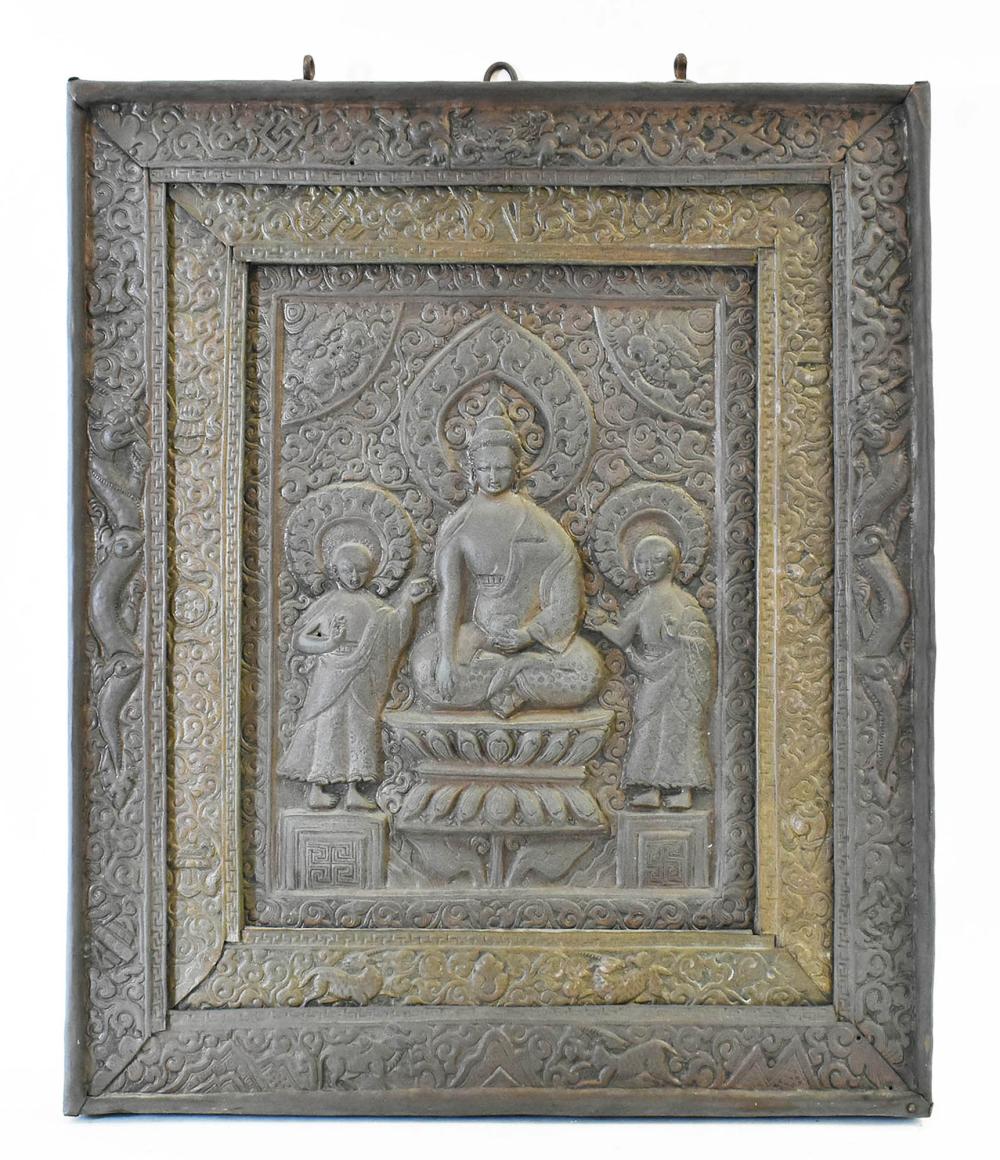 Appraisal: NEPALESE TIBETAN COPPER-CLAD RELIEF PANELThe rectangular panel with recessed center