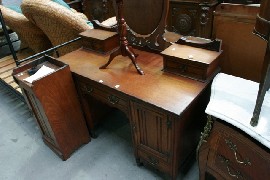 Appraisal: A late Victorian walnut dressing table matching cupboard