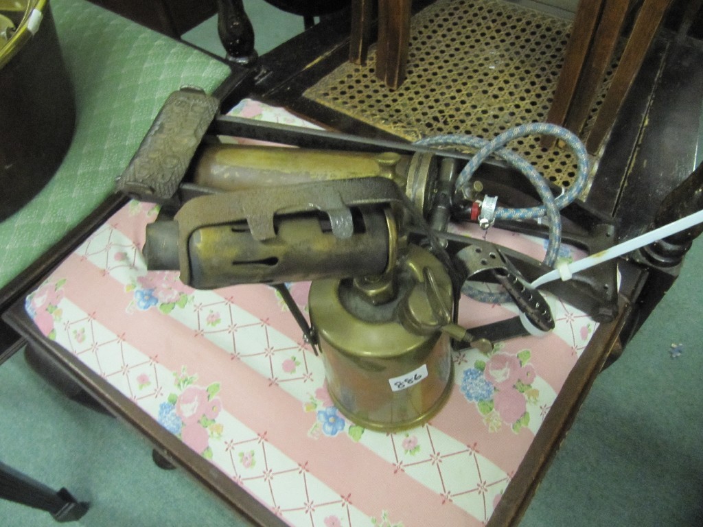 Appraisal: Vintage Dunlop car pump and a brass blow torch