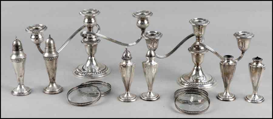 Appraisal: PAIR OF WEIGHTED STERLING SILVER THREE-LIGHT CANDELABRA Together with six