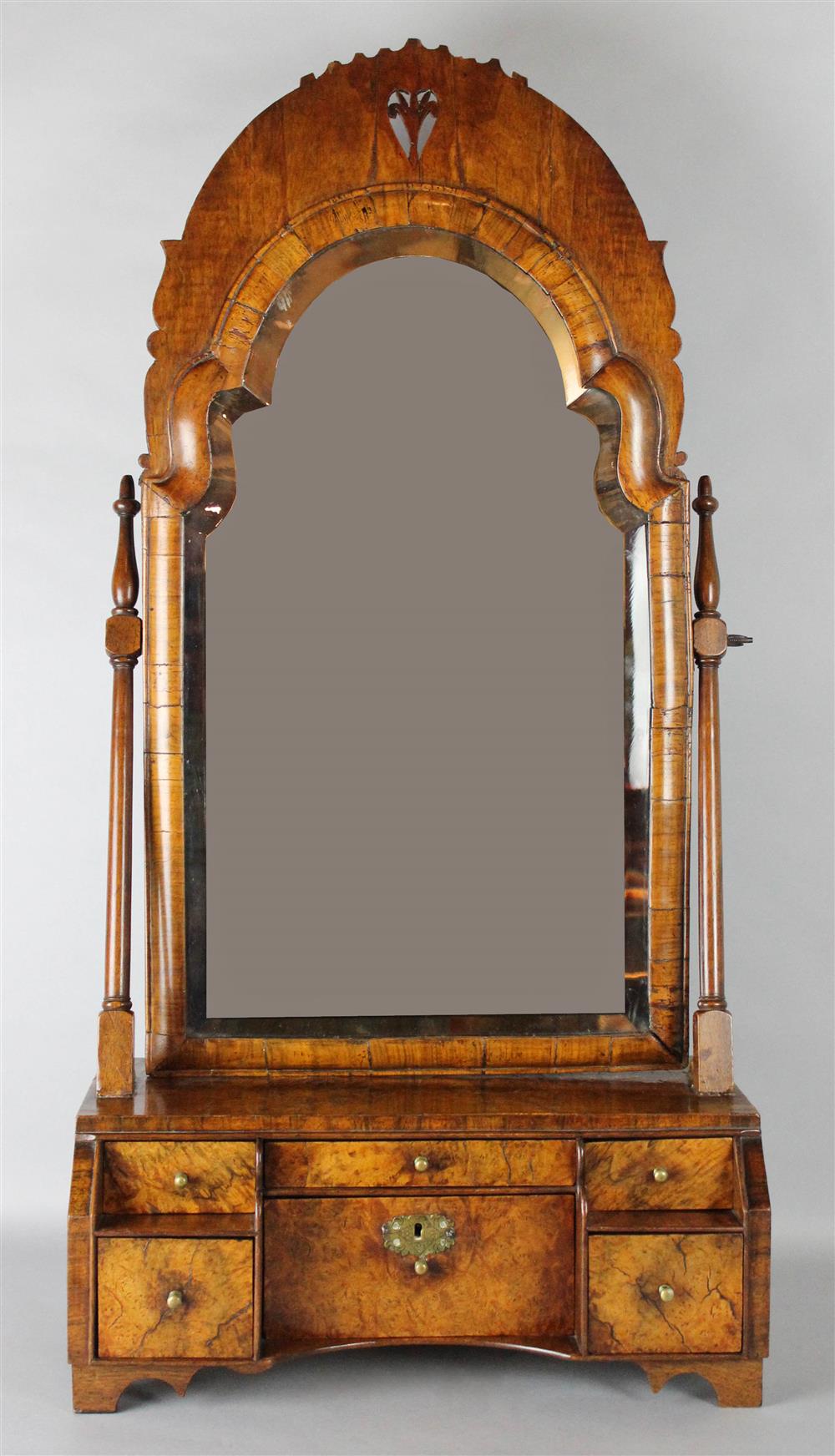 Appraisal: QUEEN ANNE WALNUT DRESSING MIRROR having an arched and pierced