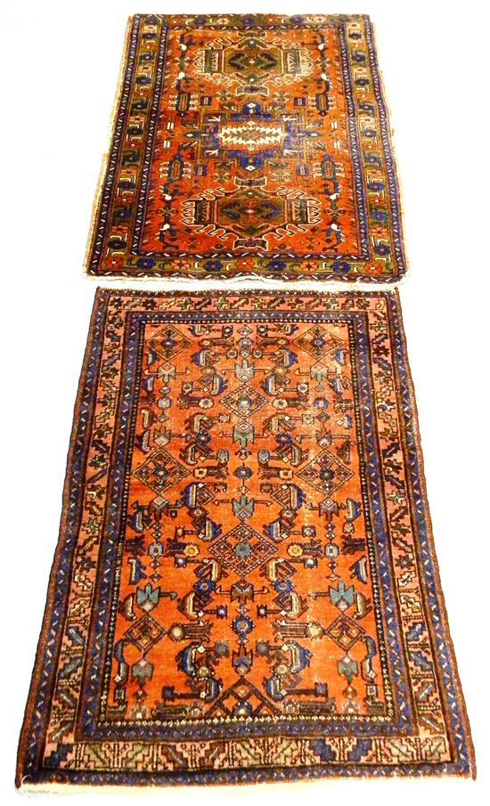 Appraisal: Persian Karaja red and brown field with blue accents ends